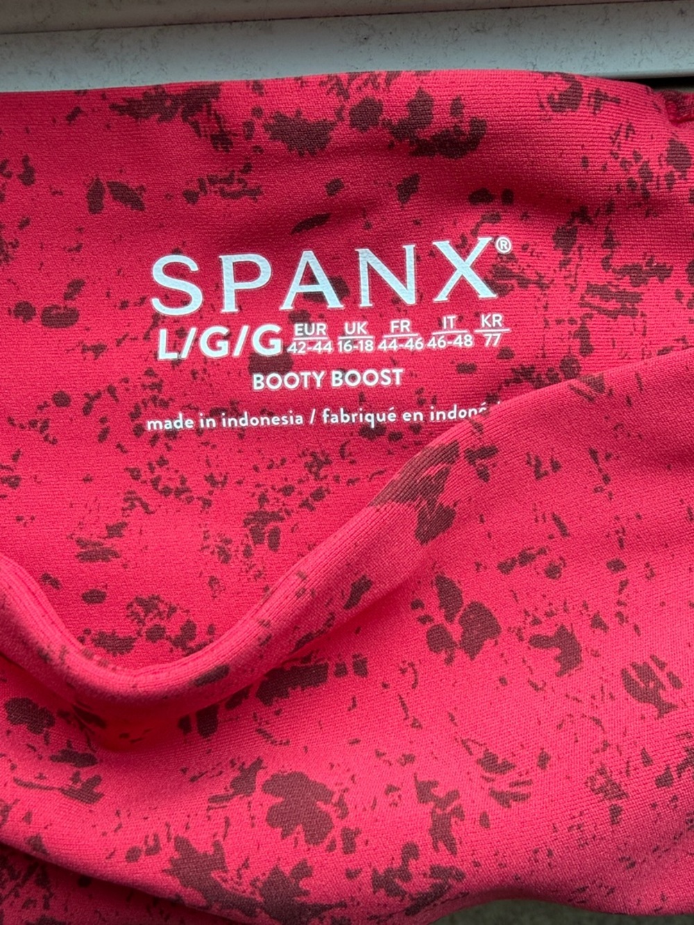 SPANX Booty Boost Leggings in Red with Black Speckle Print